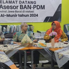 Sambutan oleh Ibu Iyus Rusmiati, S.Sos. (Kepala Sekolah SMK Al-Munir)